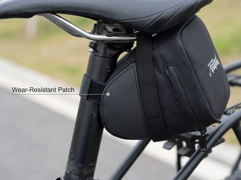 Seat pack showing a reinforced abrasion panel where it rubs against the seat post
